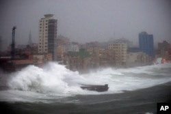 Strong waves brought by Hurricane Irma hit the Malecon seawall in Havana, Cuba, late Saturday, Sept. 9, 2017.