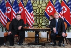 FILE - U.S. President Donald Trump and North Korea's leader Kim Jong Un meet during the second U.S.-North Korea summit at the Sofitel Legend Metropole hotel in Hanoi, Feb. 28, 2019.