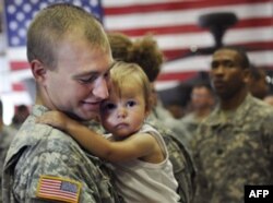 Harbiy oilalar o’g’il-qizlari jang maydonidan qaytishini kutmoqda