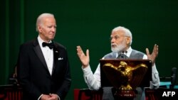 ប្រធានាធិបតី​សហរដ្ឋ​អាមេរិក​លោក Joe Biden និង​នាយករដ្ឋមន្ត្រី​ឥណ្ឌា​លោក Narendra Modi ថ្លែង​សុន្ទរកថា ក្នុង​អំឡុងពេល​នៃ​​​ទស្សនកិច្ច​របស់​លោក Modi មក​កាន់​រដ្ឋ​ធានីវ៉ាស៊ីនតោន ថ្ងៃទី ២២ ខែមិថុនា ឆ្នាំ២០២៣។ (AFP)