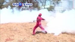 VOA60 DUNIYA: ZIMBABWE Yan Sandan Kwantar da Tarzoma Sun Harba Yajin Mai Sa Kwalla Akan Masu Zanga Zanga da ke Bore