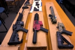 FILE - "Ghost guns" are on display at the San Francisco Police Department headquarters in this November 2019 photo. President Biden is expected to announce tighter regulations requiring buyers of ghost guns to undergo background checks, sources say.