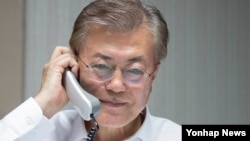 President Moon Jae-In talks over the phone with President Donald Trump.