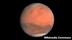 A study published Wednesday in the journal Science suggests a huge lake of salty water appears to be buried deep in Mars, raising the possibility of finding life on the red planet. 