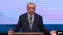 Turkish President Recep Tayyip Erdogan delivers a speech during the Annual Evaluation Meeting for 2019 at the Bestepe National Congress and Culture Center in Ankara on Jan. 16, 2020. 