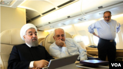 حسام الدین آشنا (راست) به همراه محمدجواد ظریف و حسن روحانی