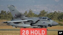 Participants take part in the annual New Year's Day Parade in central London.