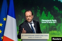 French President Francois Hollande delivers a speech during a ceremony to mark the 25th anniversary of Disneyland Paris Resort in Chessy, near Paris, Feb. 25, 2017.