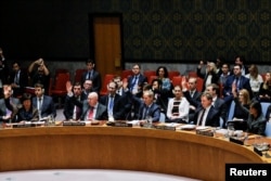 Members of the U.N. Security Council vote for cease-fire to Syrian bombing in eastern Ghouta, at U.N. headquarters in New York, Feb. 24, 2018.