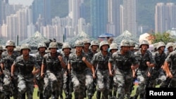 中國駐港軍隊2019年6月30日在香港昂船洲海軍基地舉行軍事表演。