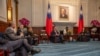 FILE - Taiwan President Tsai Ing-wen, right, meets with a U.S. delegation then in Taiwan for an annual defense forum, May 6, 2019. The Taiwan-US Defense Industry Forum will meet on May 3, 2023, in Taipei, after a pause in the meetings in 2020 because of COVID-19.