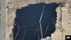 በቲ መጥቃዕቲ ዝዓነወ ህንጻ