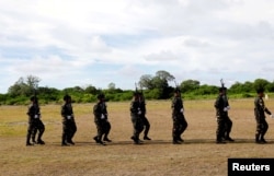 FILE PHOTO: Filipino soldiers march in Thitu island