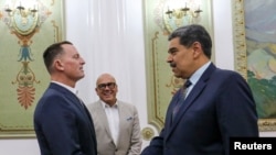 Tổng thống Venezuela Maduro và đặc phái viên Mỹ Richard Grenell tại Caracas, ngày 30/1/2025.