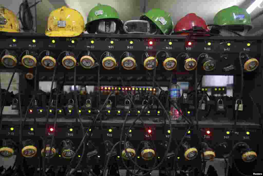 Headlights are charged inside a changing room of a coal mine after a mining disaster in Soma, a district in Turkey's western province of Manisa, May 14, 2014. Rescuers were still trying to reach parts of the coal mine almost 48 hours after fire knocked out power and shut down ventilation shafts and elevators, trapping hundreds underground. (Reuters)