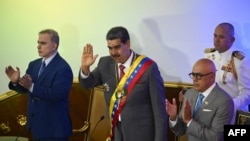 En la imagen del 15 de enero de 2024 aparecen el presidente venezolano, Nicolás Maduro (centro), el fiscal general de Venezuela, Tarek William Saab (izquierda.), y el presidente de la Asamblea Nacional, Jorge Rodríguez.