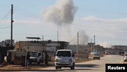Smoke rises in a site hit by what activists said were airstrikes carried out by the Russian air force in the town of Saraqib, in Idlib province, Syria, Jan. 9, 2016.
