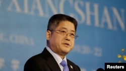 2019年时任中国外交部副部长的乐玉成在北京一个论坛上发表讲话。（资料照片，2019年10月22日）