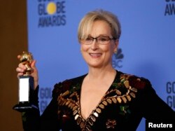 FILE - Meryl Streep holds the Cecil B. DeMille Award during the 74th Annual Golden Globe Awards in Beverly Hills, California, Jan. 8, 2017.