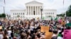 Protesters gather outside the Supreme Court in Washington, Friday, June 24, 2022. The Supreme Court has ended constitutional protections for abortion that had been in place nearly 50 years. (AP Photo/Jacquelyn Martin)