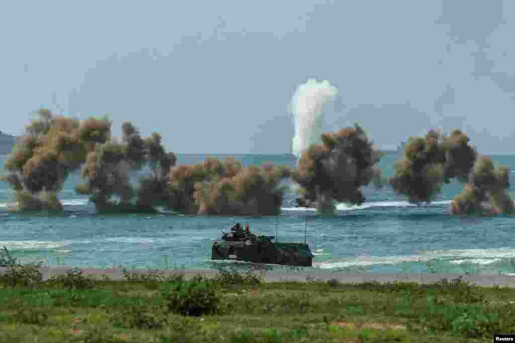 Smoke rises from an amphibious assault vehicles (AAV) participating in the "Cobra Gold 2025&rdquo; (CG25) joint&nbsp;military&nbsp;exercise at a&nbsp;military&nbsp;base in Chonburi province,&nbsp;Thailand.