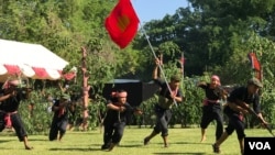 Cambodian students from Royal University of Fine Arts reenact torture and execution by the Khmer Rouge during their reign of terror in the 1970s in an event hosted by the ruling Cambodian People's Party to mark the annual Day of Anger at Choeung Ek, outside Phnom Penh, Cambodia.