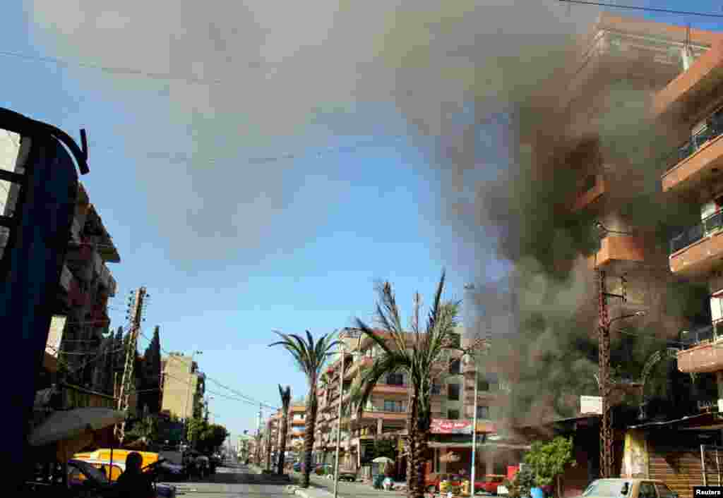 Livanning Tripoli shahridagi manzara, 21-avgust. Qo'shni Suriyadagi urush bu yerda ham aks-sado berib, sunniylar va allaviylar olishmoqda.