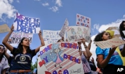 Supporters of Deferred Action for Childhood Arrival program (DACA) demonstrate in front of the White House, Sept. 9, 2017.