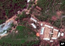 FILE - This Wednesday, May 23, 2018 satellite file image provided by DigitalGlobe, shows the Punggye-ri test site in North Korea.