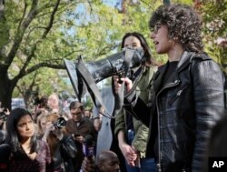 Meredith Whittaker, a research scientist at New York University who leads Google's Open Research Group, addresses hundreds of Google employees during a protest rally on Nov. 1, 2018, in New York.