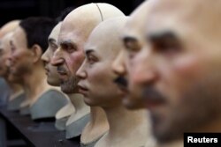 Heads for humanoid robots sit on a table at the office of developer Ex-Robots in Dalian, Liaoning province, China June 6, 2024. (REUTERS/Florence Lo)