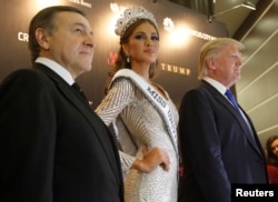 FILE - Miss Universe 2013 Gabriela Isler, Donald Trump, co-owner of the Miss Universe Organization, and businessman Aras Agalarov take part in a news conference after the Miss Universe pageant at the Crocus City Hall in Moscow Nov. 9, 2013.