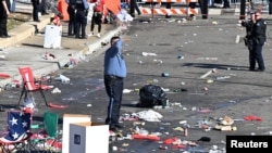 La policía despeja el área después de que se realizaron disparos tras de la celebración de la victoria de los Kansas City Chiefs en el Super Bowl LVIII, el 14 de febrero de 2024 en Kansas City, Missouri, EEUU.[Foto: David Rainey-USA TODAY Sports].
