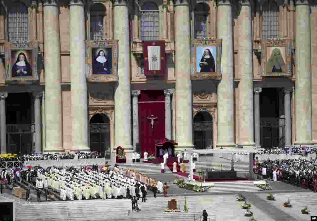 Pope Francis celebrates a canonization ceremony of four new saints in St. Peter's Square at the Vatican, May 17, 2015. Sisters Mariam Bawardy and Marie Alphonsine Ghattas were among four sisters who were made saints at a Mass in a sun-soaked St. Peter's Square.
