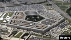 FILE - An aerial view of the Pentagon building in Washington, June 15, 2005. 