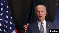 El presidente de EE. UU., Joe Biden, habla a miembros de la comunidad de inteligencia en la Oficina del Director Nacional de Inteligencia, en Virginia, el 27 de julio de 2021.