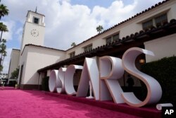 A view of the red carpet appears before the start of the Oscars on Sunday, April 25, 2021, at Union Station in Los Angeles. (AP Photo/Chris Pizzello, Pool)