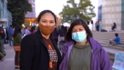 Tanny Jiraprapasuke (R) Walaipan Kesthong (L), members of Thai communities in Los Angeles attend the event and take part to raise awareness about the increase in hate crimes against Asians in the US at the Japanese American National Museum in Los Angeles,