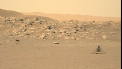 This file photo, captured by NASA's Perseverance rover, shows the Ingenuity helicopter on the surface of Mars. The image was received on June 15, 2021. (Credit: NASA/JPL-Caltech/ASU)