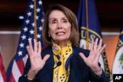 FILE - House Speaker Nancy Pelosi, D-Calif., talks to reporters on Capitol Hill, Jan. 24, 2019.