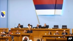 Valentina Matviyenko, speaker of the Federation Council, Russian parliament's upper chamber, center, addresses the Republic of Srpska Parliament in the Bosnian town of Banja Luka, Tuesday, April 24, 2018. Matviyenko is on a one day trip to meet with Republic of Srpska officials. 