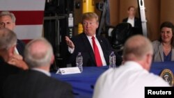 Presiden Donald Trump menghadiri diskusi tentang perdagangan di Duluth, Minnesota, 20 Juni 2018.