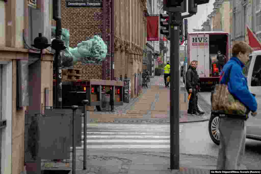 A replica of Michel Angelo's statue of David is being transported from Copenhagen's waterfront to the National Gallery of Denmark, in Copenhagen, Denmark.