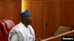Senator Bukola Saraki looks on after being elected as the senate president of the 8th Nigeria Assembly in Abuja, Nigeria June 9, 2015. REUTERS/Afolabi Sotunde - RTX1FRVG