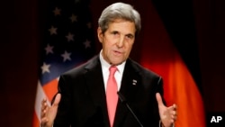 FILE - U.S. Secretary of State John Kerry delivers his speech after he receives Germany's Federal Cross of Merit from German Foreign Minister Frank-Walter Steinmeier during a ceremony at the foreign ministry in Berlin, Dec. 5, 2016.