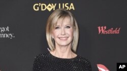 FILE - In this Jan. 27, 2018 file photo, Olivia Newton-John attends the 2018 G'Day USA Los Angeles Gala at the InterContinental Hotel Los Angeles. 