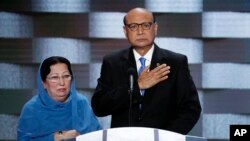 Khizr Khan, father of fallen US Army Capt. Humayun S. M. Khan, and his wife, Ghazala, speak during the final day of the Democratic National Convention in Philadelphia, July 28, 2016. 