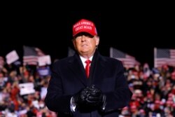 U.S. President Donald Trump speaks during a campaign rally at Kenosha Regional Airport in Kenosha, Wisconsin, U.S., November 2, 2020. REUTERS/Carlos Barria