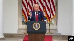 Predsednik Donald Tramp na brifingu u Beloj kući, 26. maj 2020. (Foto: AP/Evan Vucci)
