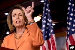 FILE - House Minority Leader Nancy Pelosi of California speaks during her weekly press conference on Capitol Hill, Oct. 26, 2017.